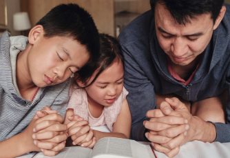 3 people with folded hands